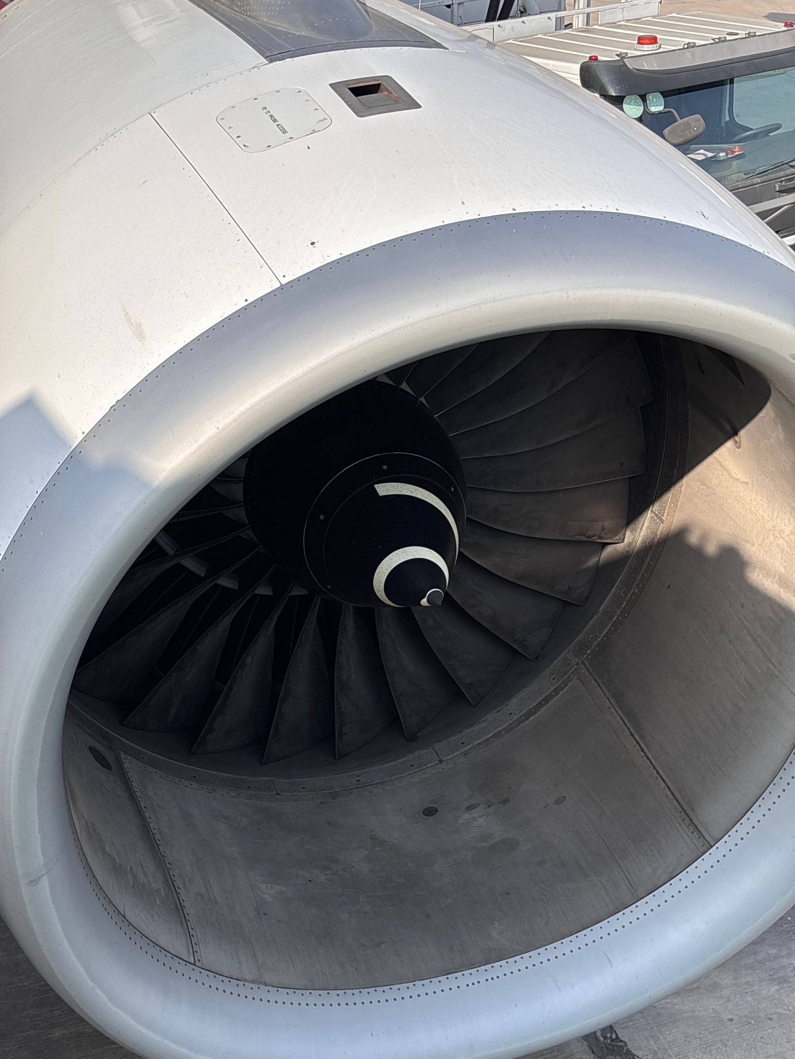 Close-up of a jet engine turbine under inspection